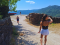 tourists walking through a mountain village